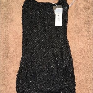 Black beaded Oh Polly dress. Brand new with tags.
